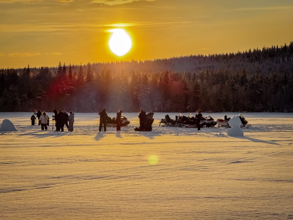 Ice Fishing with Snowmobiles in Rovaniemi Lapland Finland Hungrytravelfamily